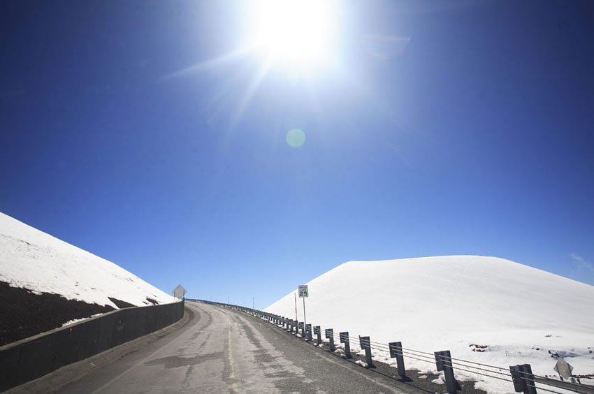 Snow covers a cinder cone