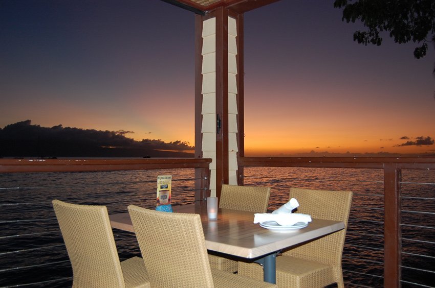 Oceanfront dining at sunset on Maui