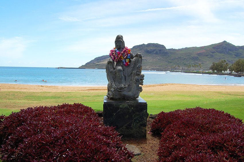 Statue decorated with flower leis