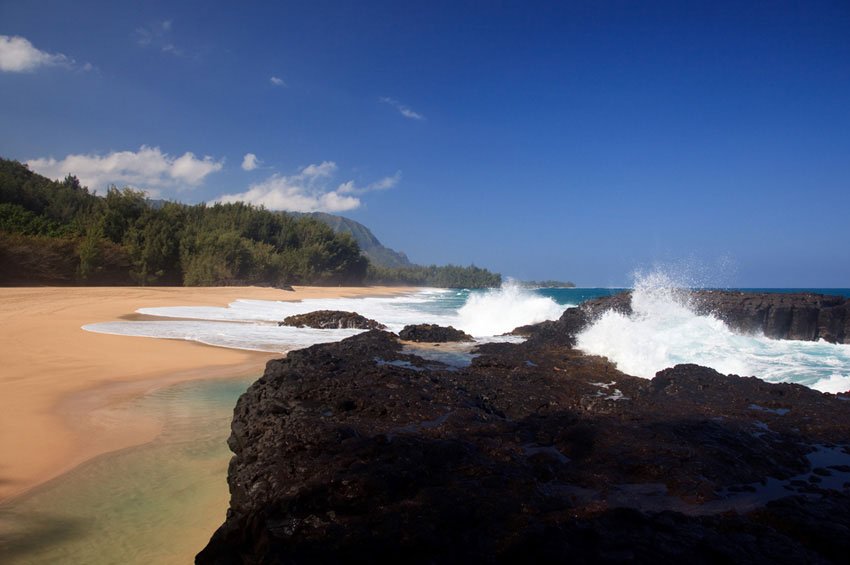 Waves wash over rocks