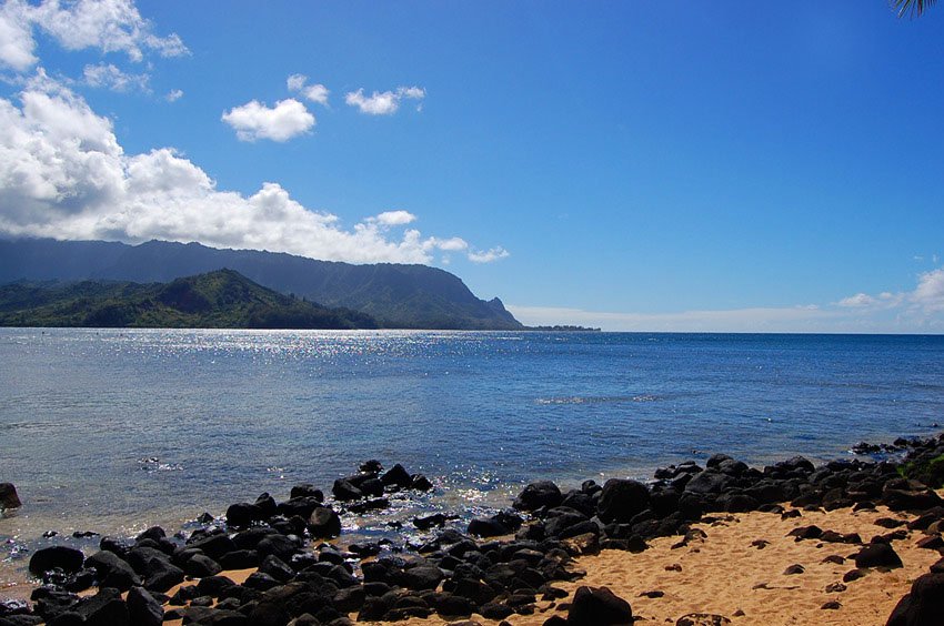 Black lava rocks and blue ocean