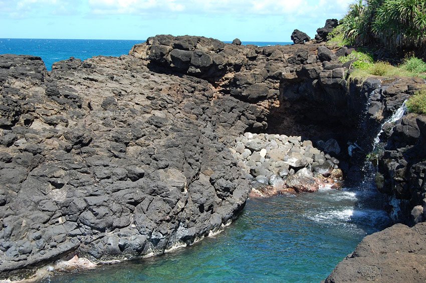 Third waterfall plunges into ocean