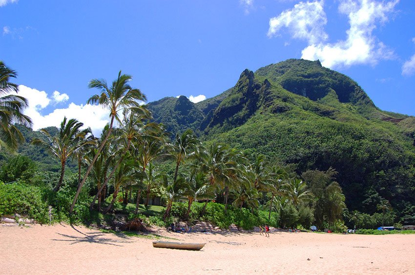 Backed by lush Kauai mountains