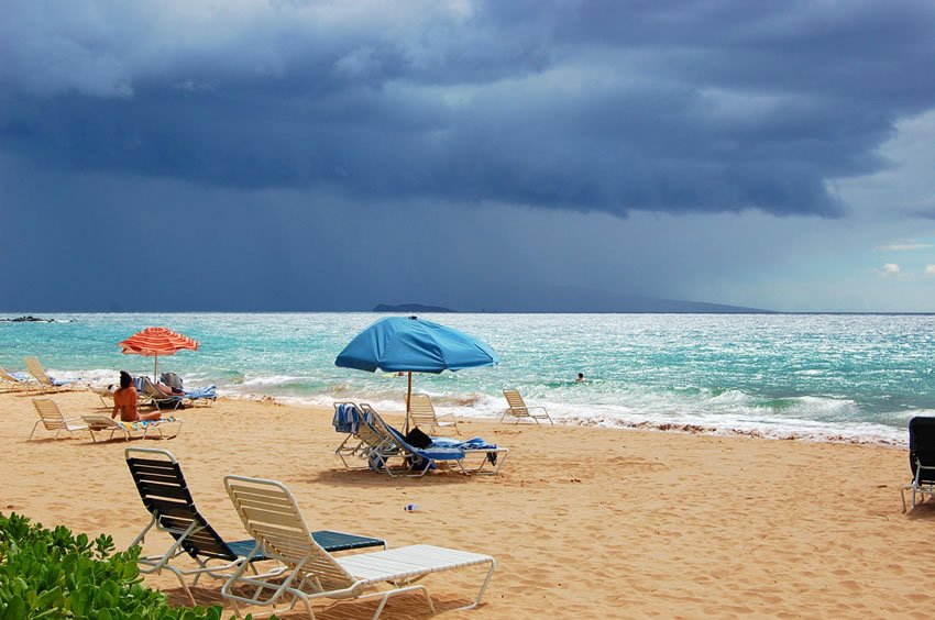 Dark clouds over the beach