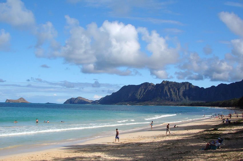 People relaxing on Oahu beach