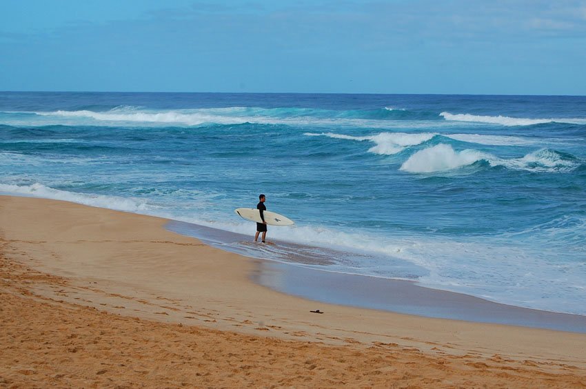 Surfer getting ready to go