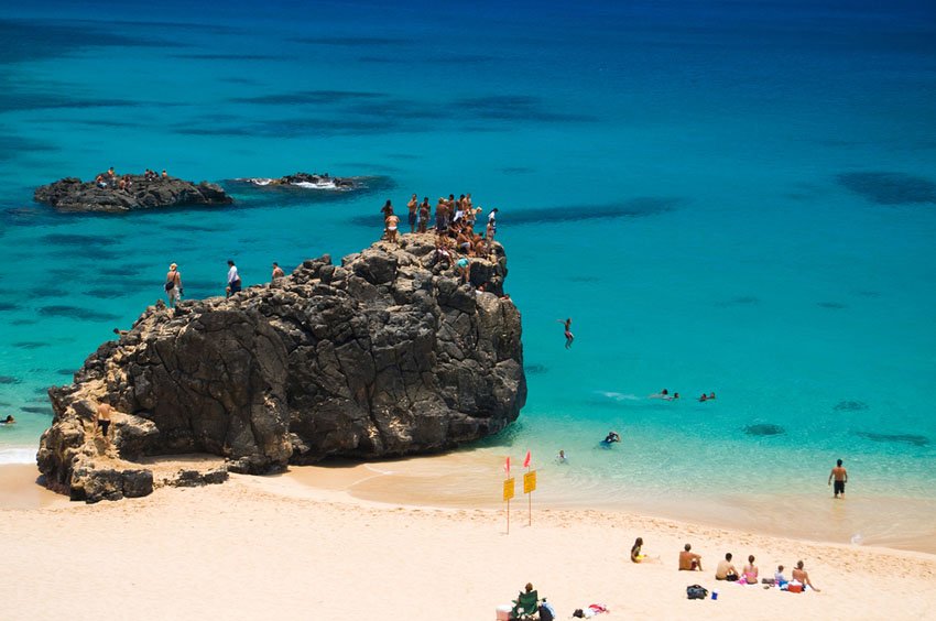 Popular jumping rock at Waimea Bay