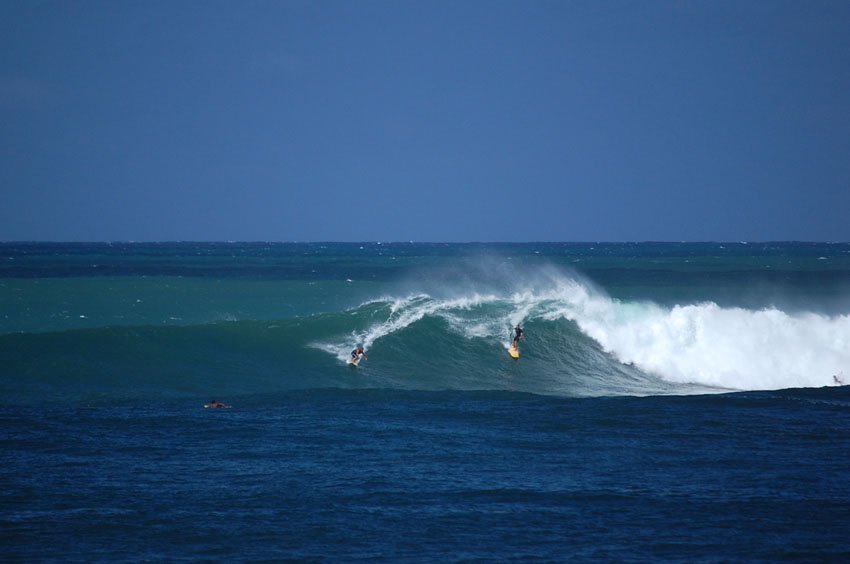 Surfing at Waimea Bay